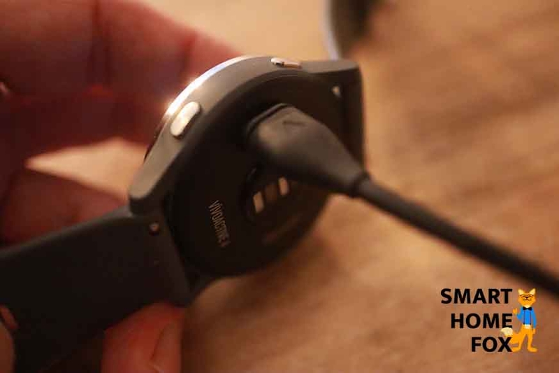 The Garmin vivoactive 4 being charged.